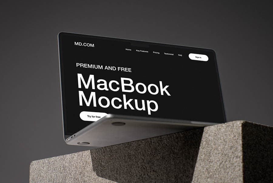 MacBook on concrete cube mockup