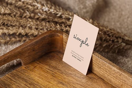 Business card in wooden tray mockup