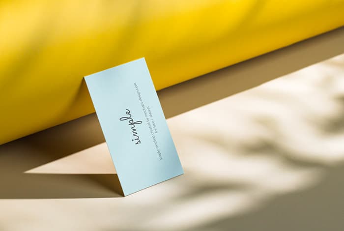 Business card with yellow background mockup