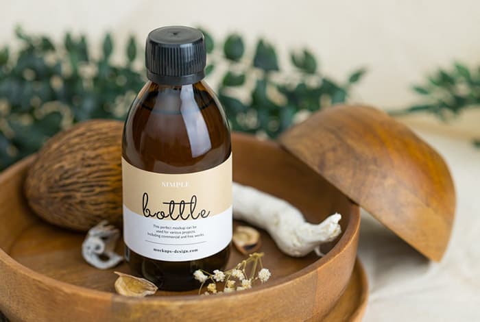 Sirup bottle on wooden tray mockup