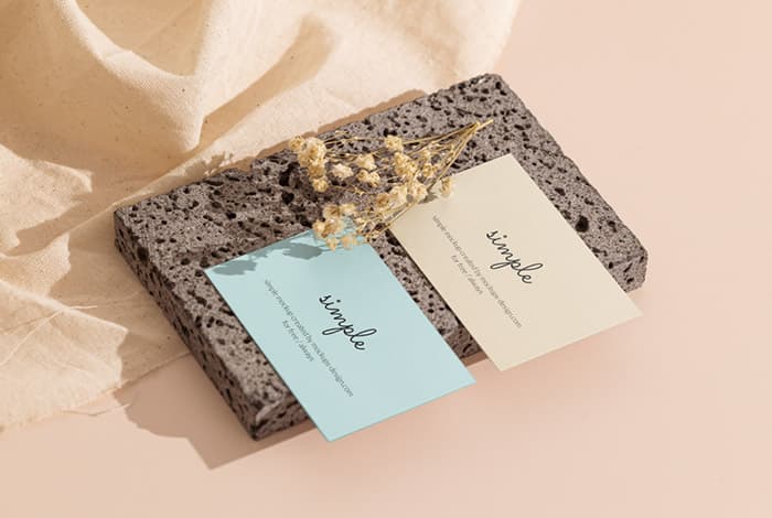 Two business cards on stone mockup