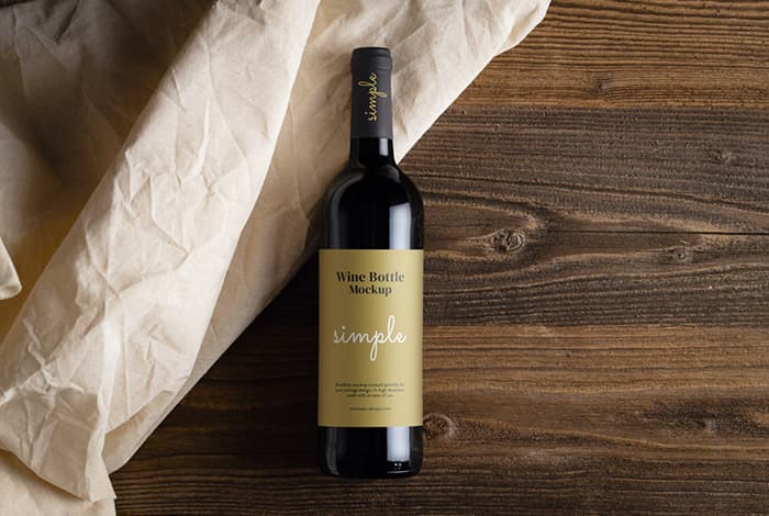 Wine bottle on wooden planks mockups