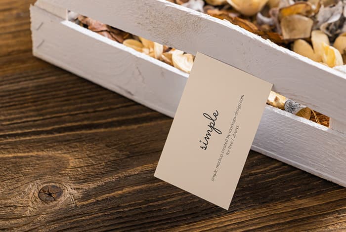 Business card on wooden crate mockup