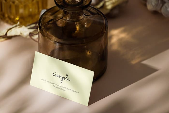 Business card with glass vase mockup