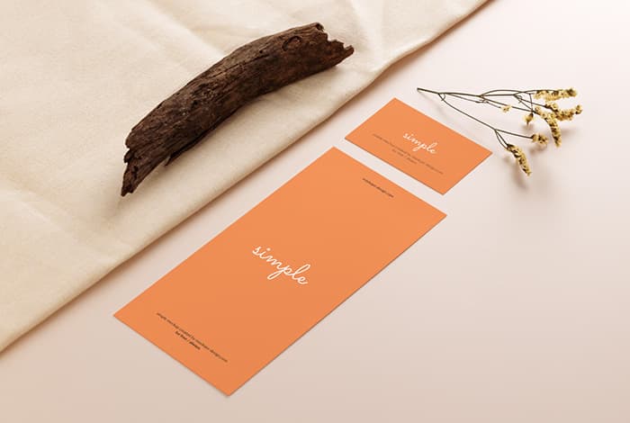 DL flyer with business card on beige background mockup