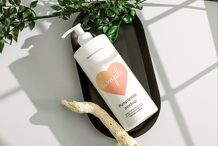White pump bottle on tray mockup