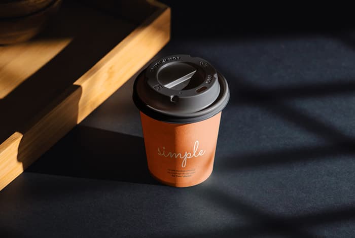Coffee cup on black background mockup