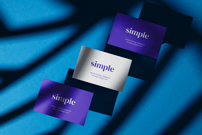 Three business card on blue background mockup