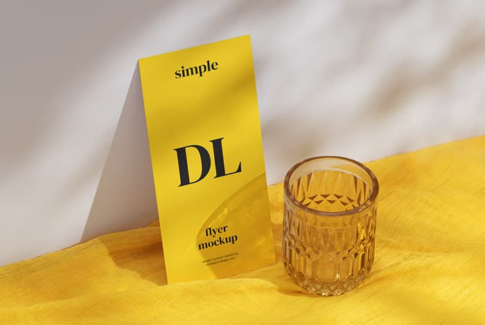 DL flyer on yellow fabric mockup