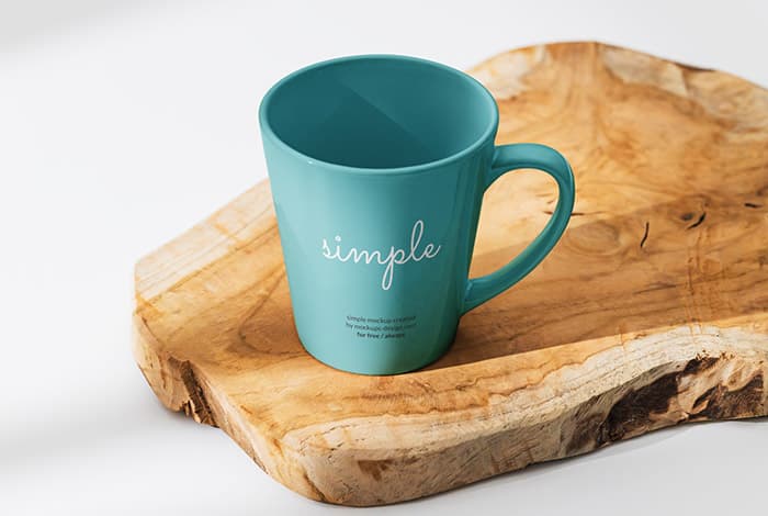 Ceramic mug on a slice of wood mockup