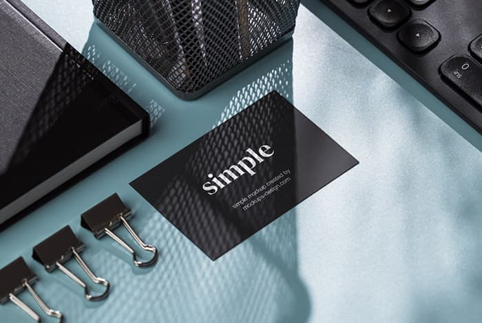 Mockup of business cards in office setting