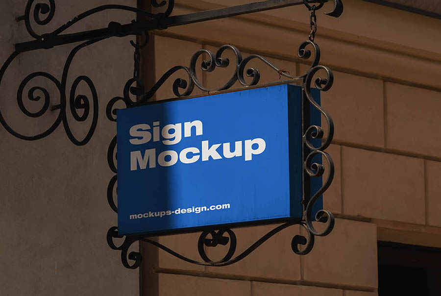 Ornate hanging wrought iron signboard mockup